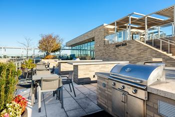 Rooftop dining areas and grilling stations